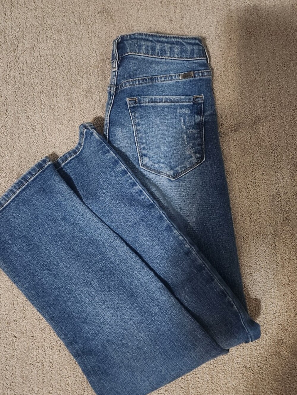 KanCan light blue denim jeans with tan stitching